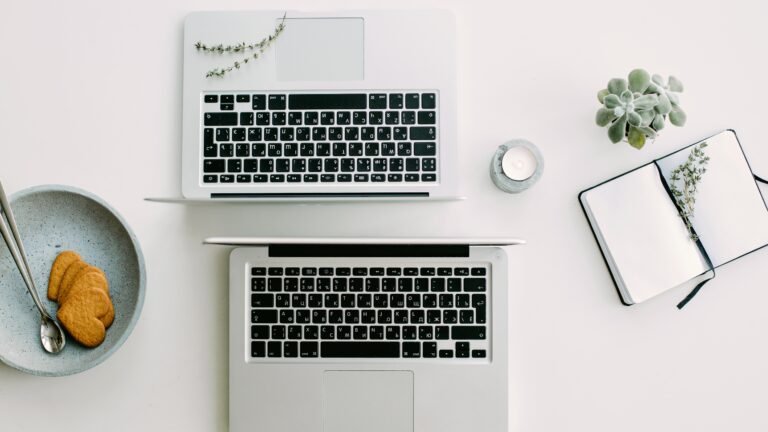 two laptops - online writing jobs for beginners